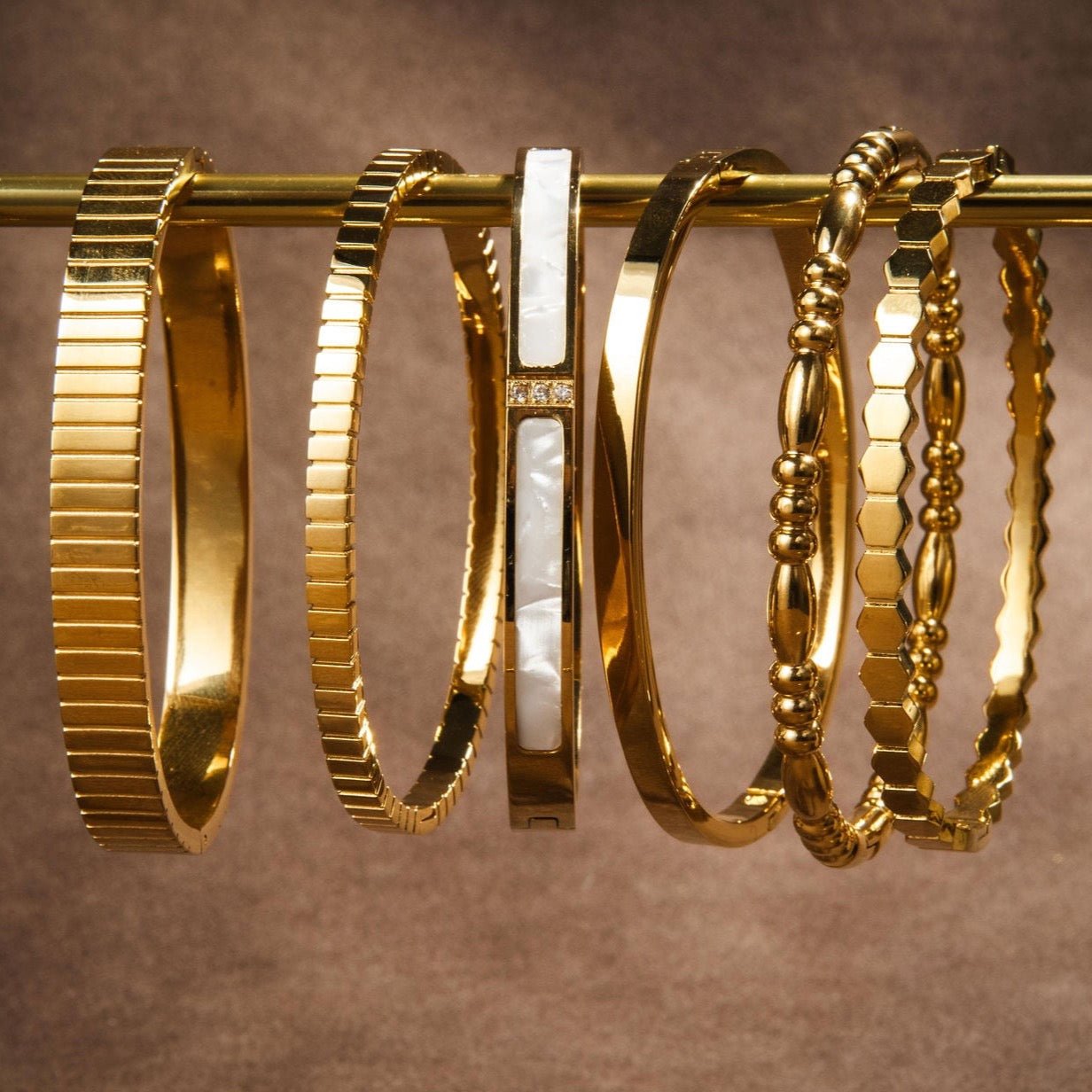 waterproof gold bangle with mother of pearl inlay and Cubic Zirconia