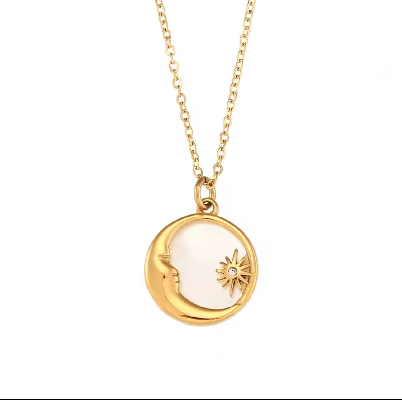 Gold moon and star pendant necklace with mother of pearl inlay and Cubic Zirconia detail on a waterproof chain