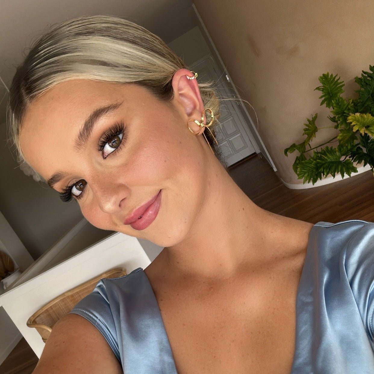 statement gold short drop bow earrings