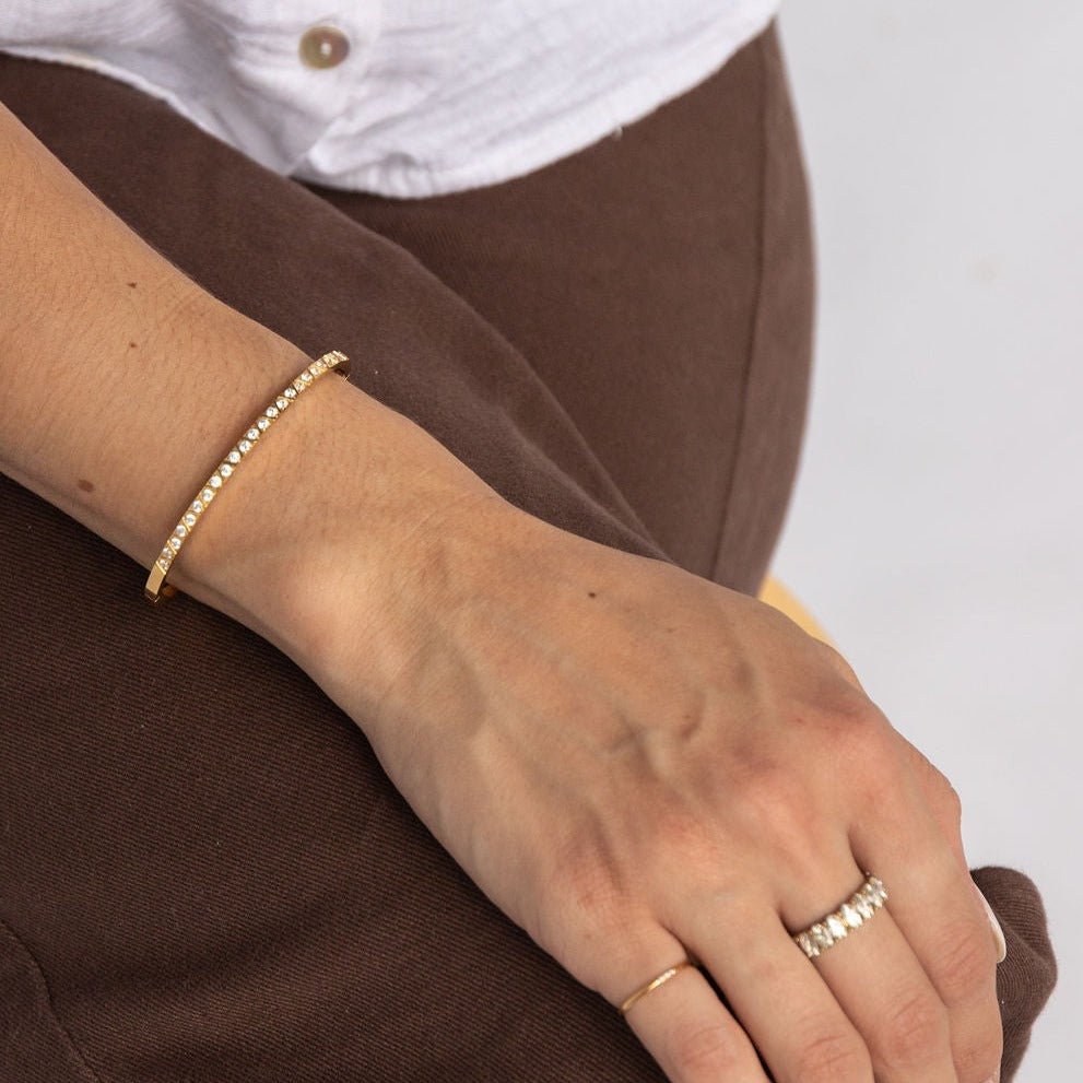 gold-plated bangle with cubic zirconia and etched criss-cross detail