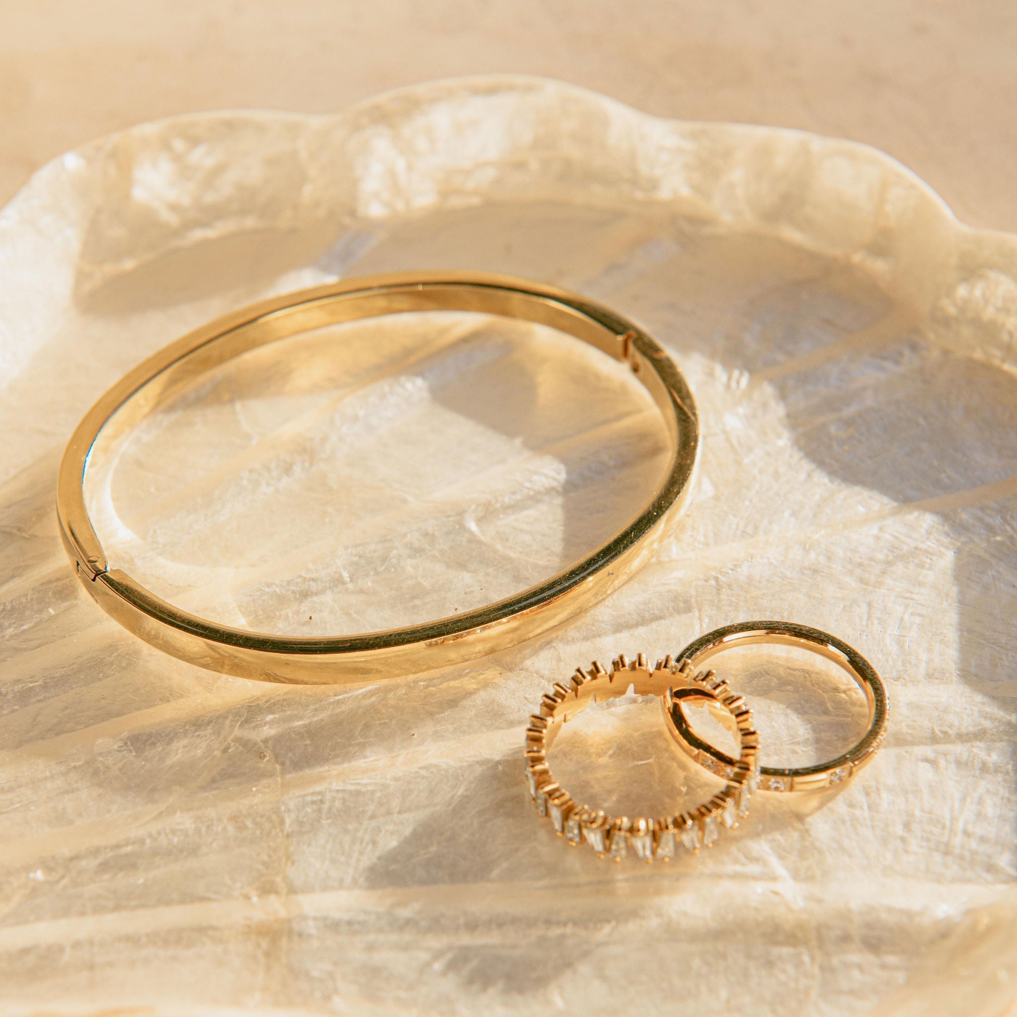 waterproof gold bangle bracelet with smooth minimalist finish