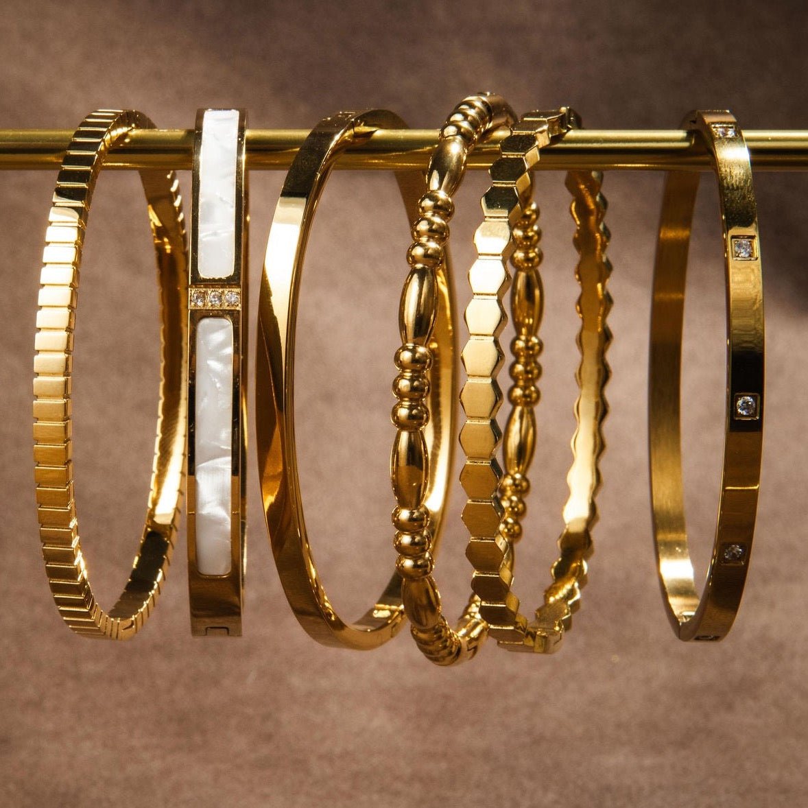 waterproof gold bangle bracelet with smooth minimalist finish