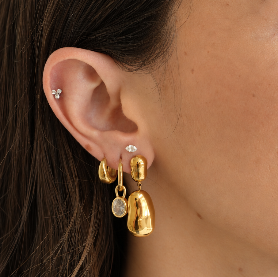 Capri gold stud earrings with polished organic-shaped drops