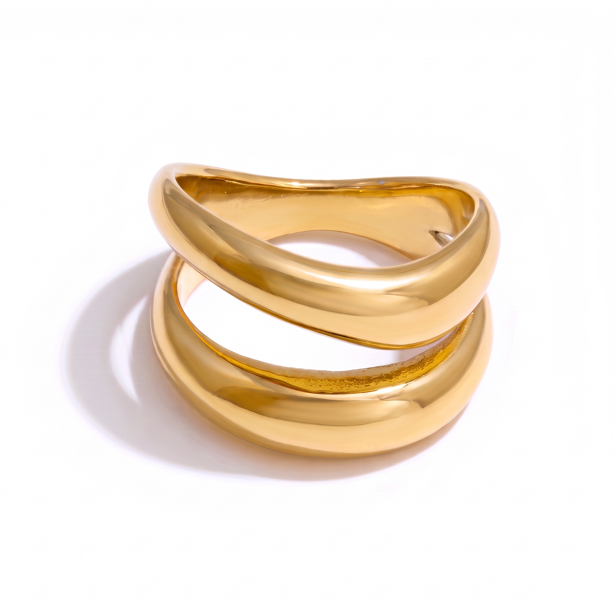 Cove sculptural gold statement ring with an open-front double-band design