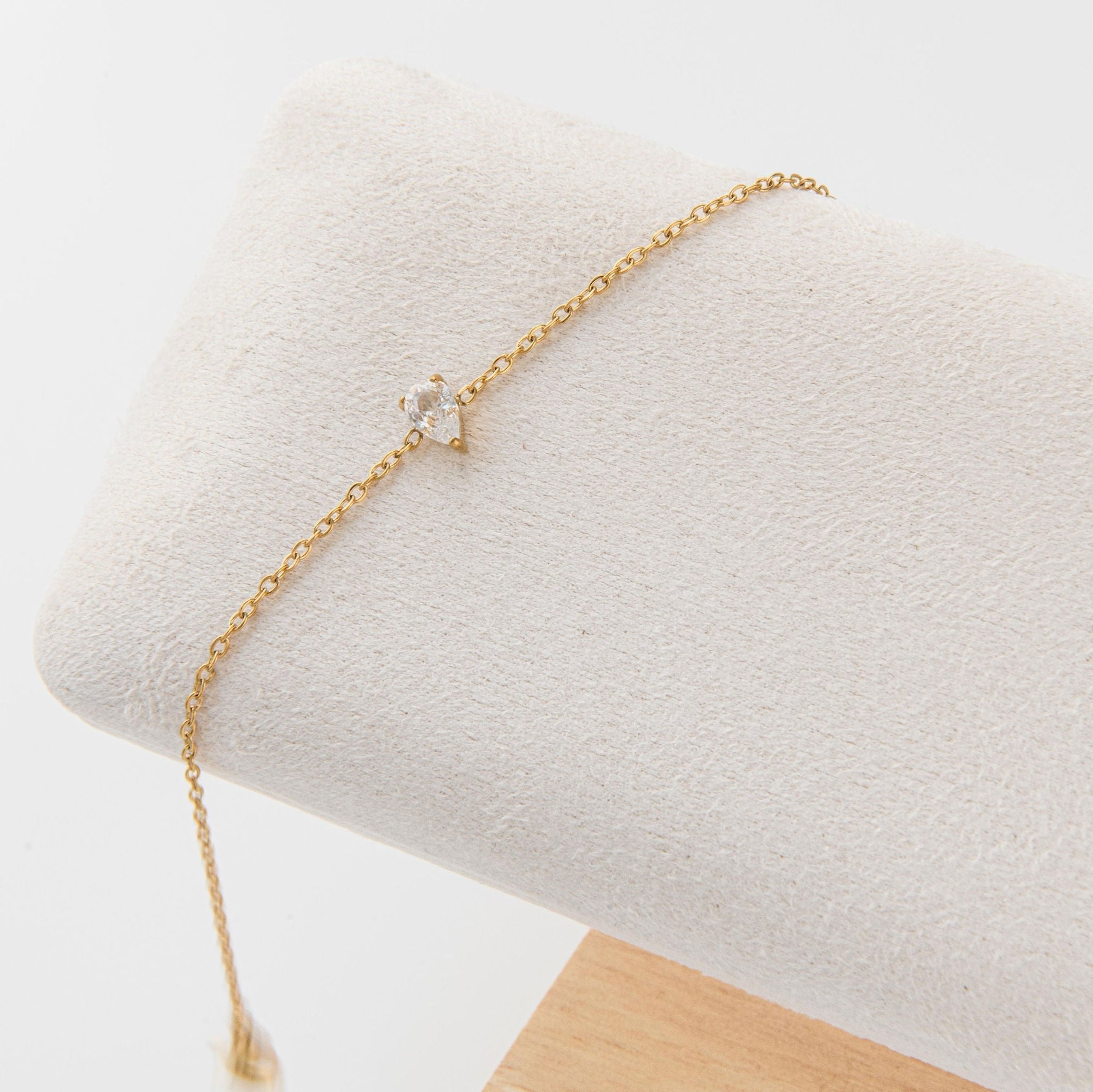 dainty gold bracelet with teardrop cubic zirconia on fine chain