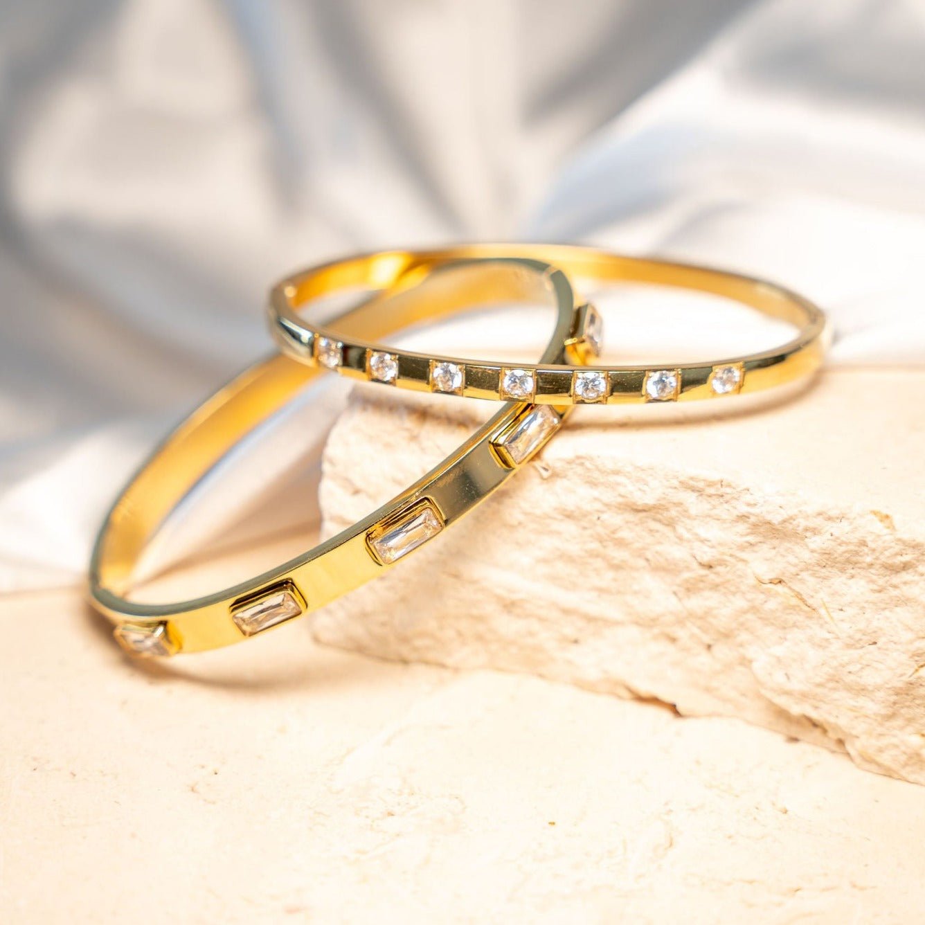 Waterproof gold bangle bracelet with baguette cubic zirconia stones