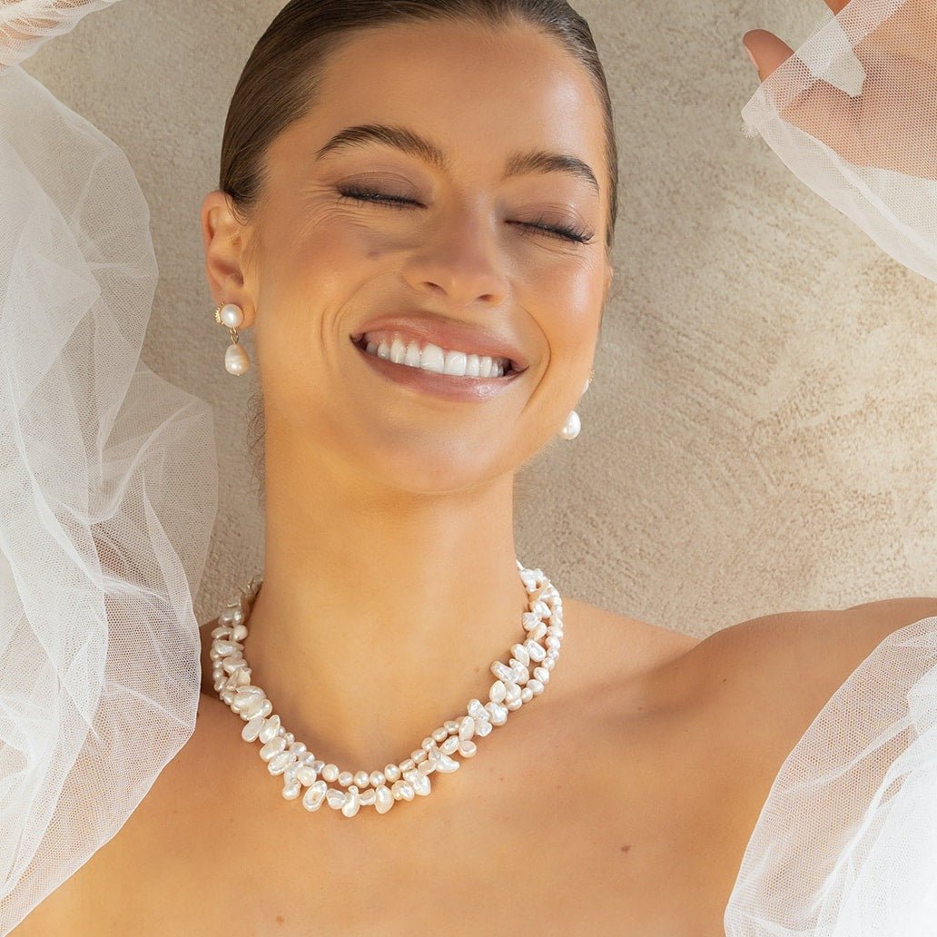 Layered pearl necklace with irregular natural freshwater pearls and gold clasp