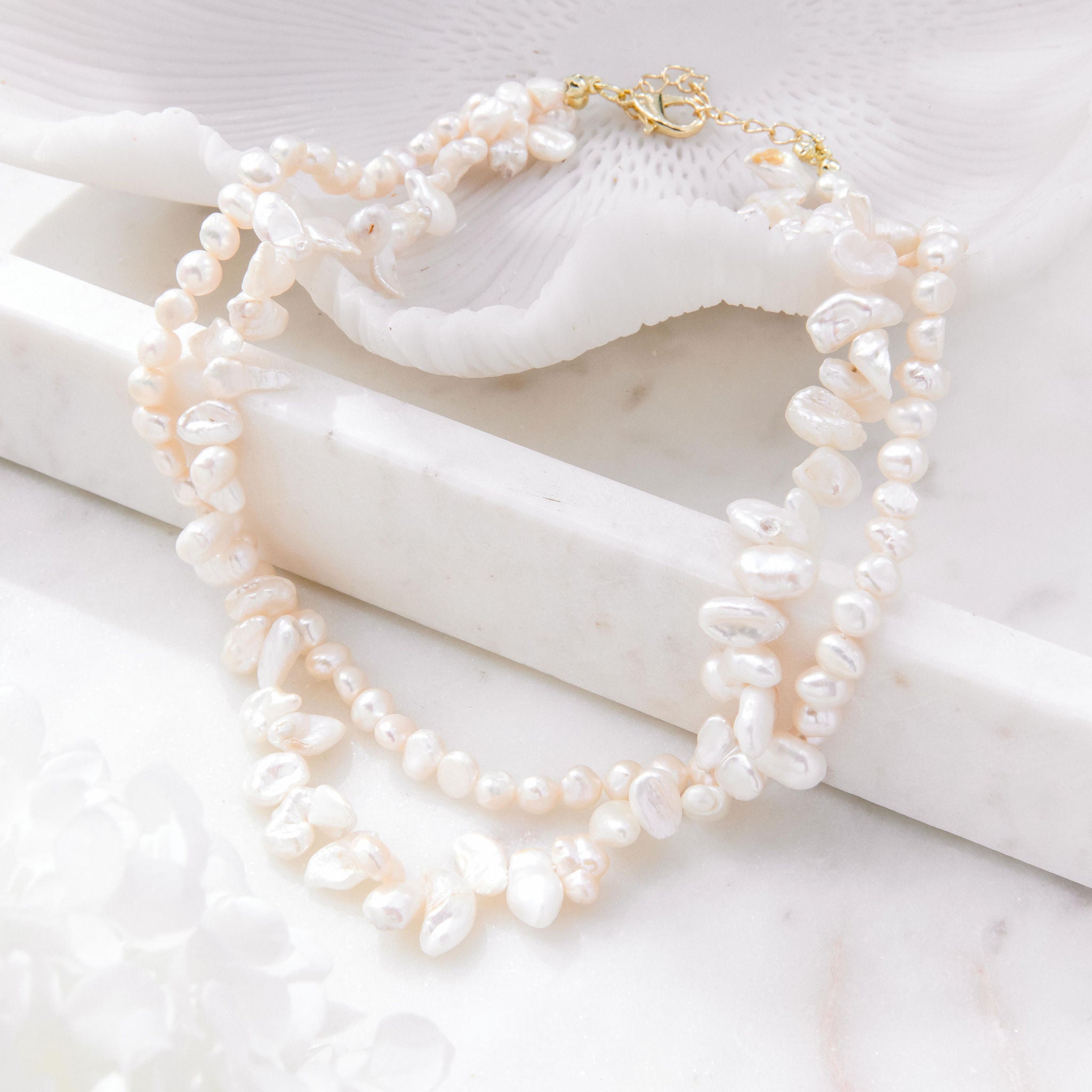 Layered pearl necklace with irregular natural freshwater pearls and gold clasp