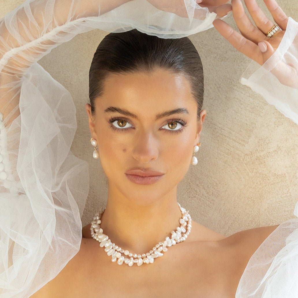 Layered pearl necklace with irregular natural freshwater pearls and gold clasp