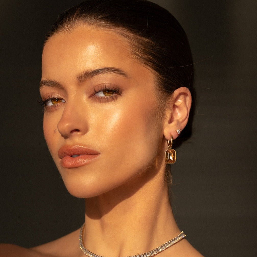gold huggie hoop earrings with champagne emerald-cut cubic zirconia for bridal or event styling