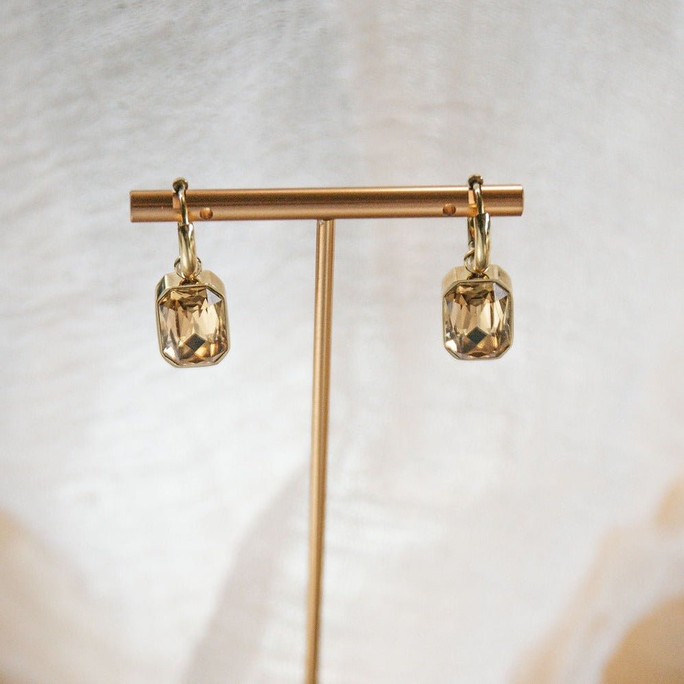 gold huggie hoop earrings with champagne emerald-cut cubic zirconia for bridal or event styling
