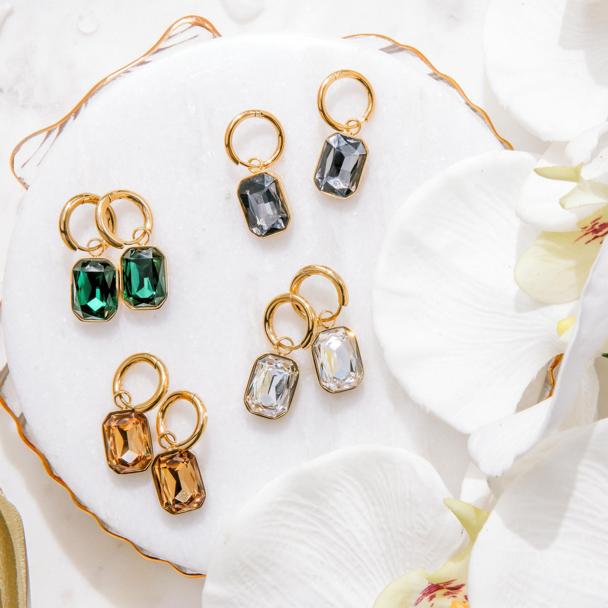 gold huggie earrings with charcoal Cubic Zirconia stones