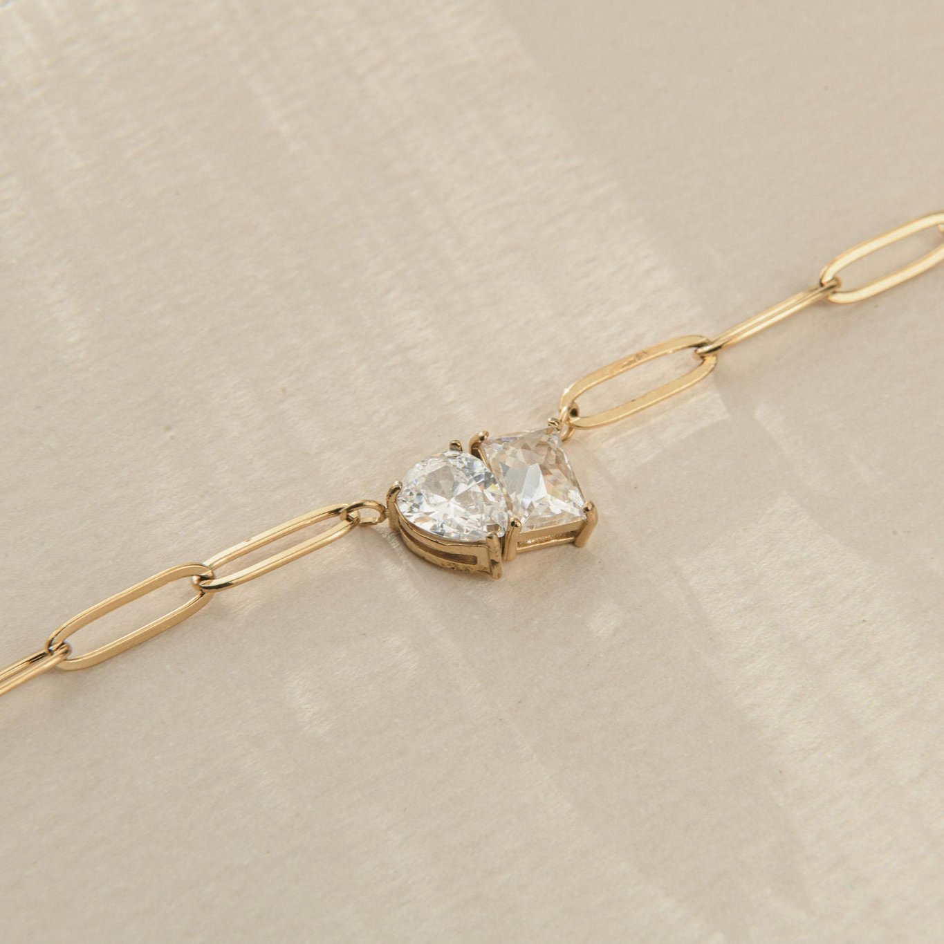 gold paperclip anklet with two cubic zirconia stones in Toi et Moi setting
