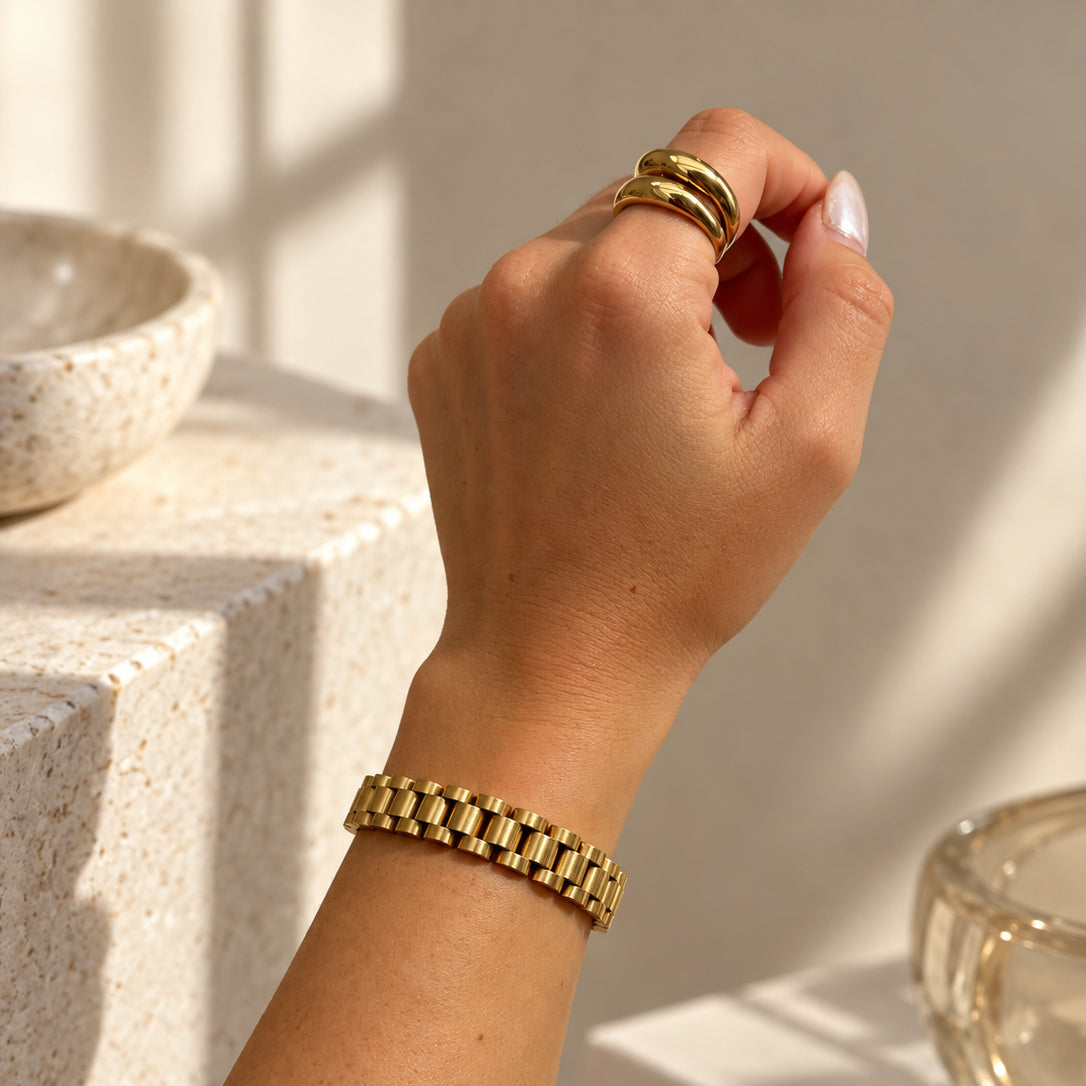 Lune gold bracelet with watchband-style chain with Cove statement ring