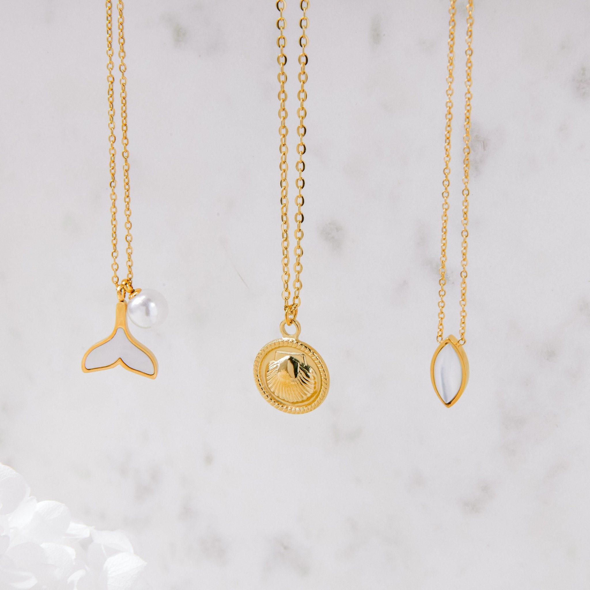 Gold marquise pendant necklace with mother of pearl inlay and waterproof chain
