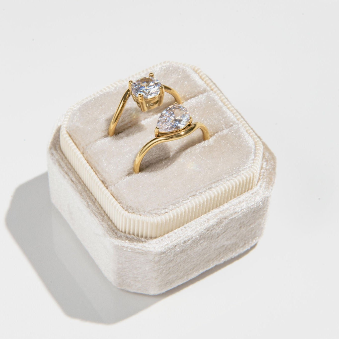 gold ring with round cut cubic zirconia stone in prong setting