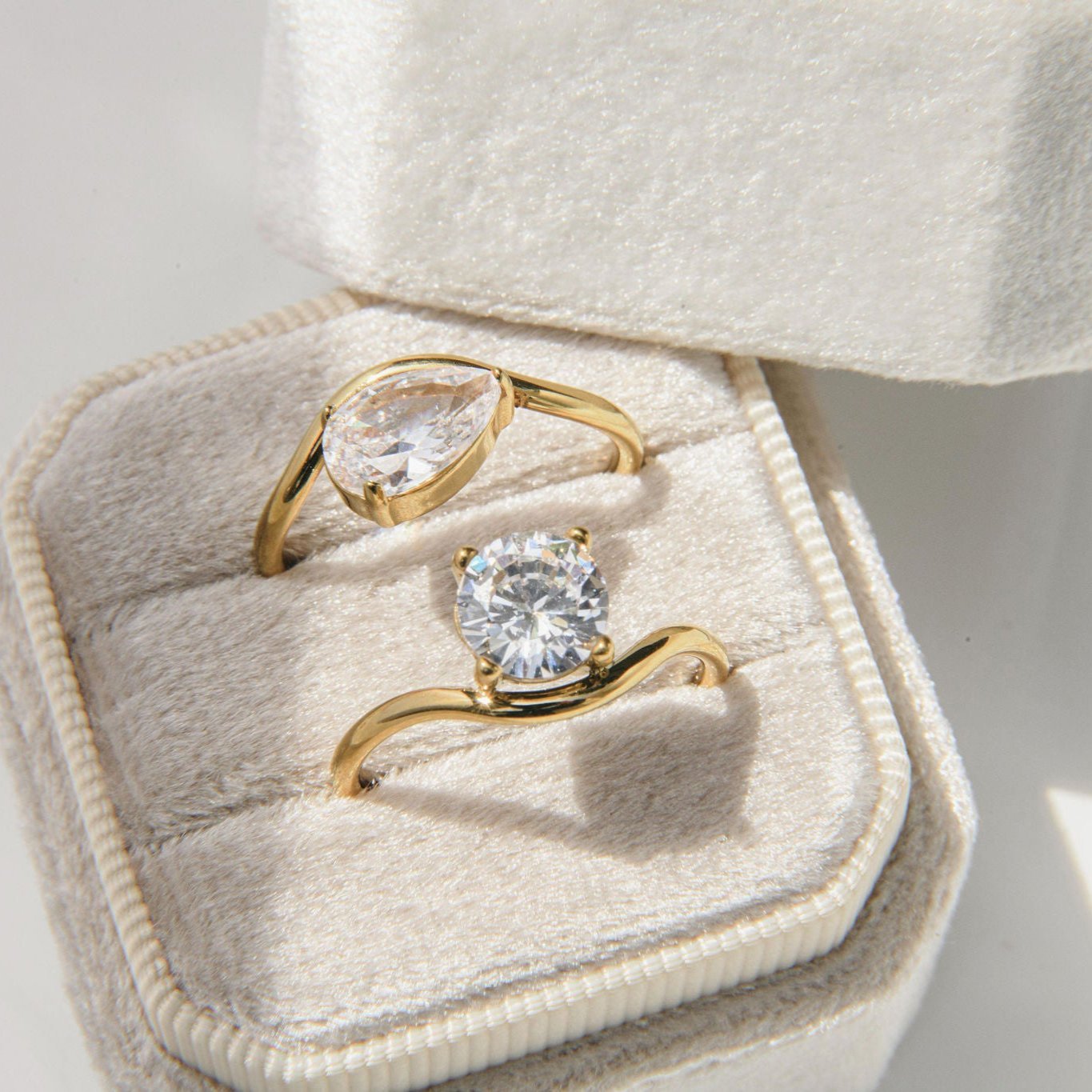 gold ring with round cut cubic zirconia stone in prong setting