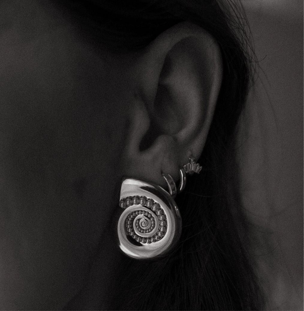 Paradiso Earrings with spiral gold shell design and pearl accents, gold statement earrings