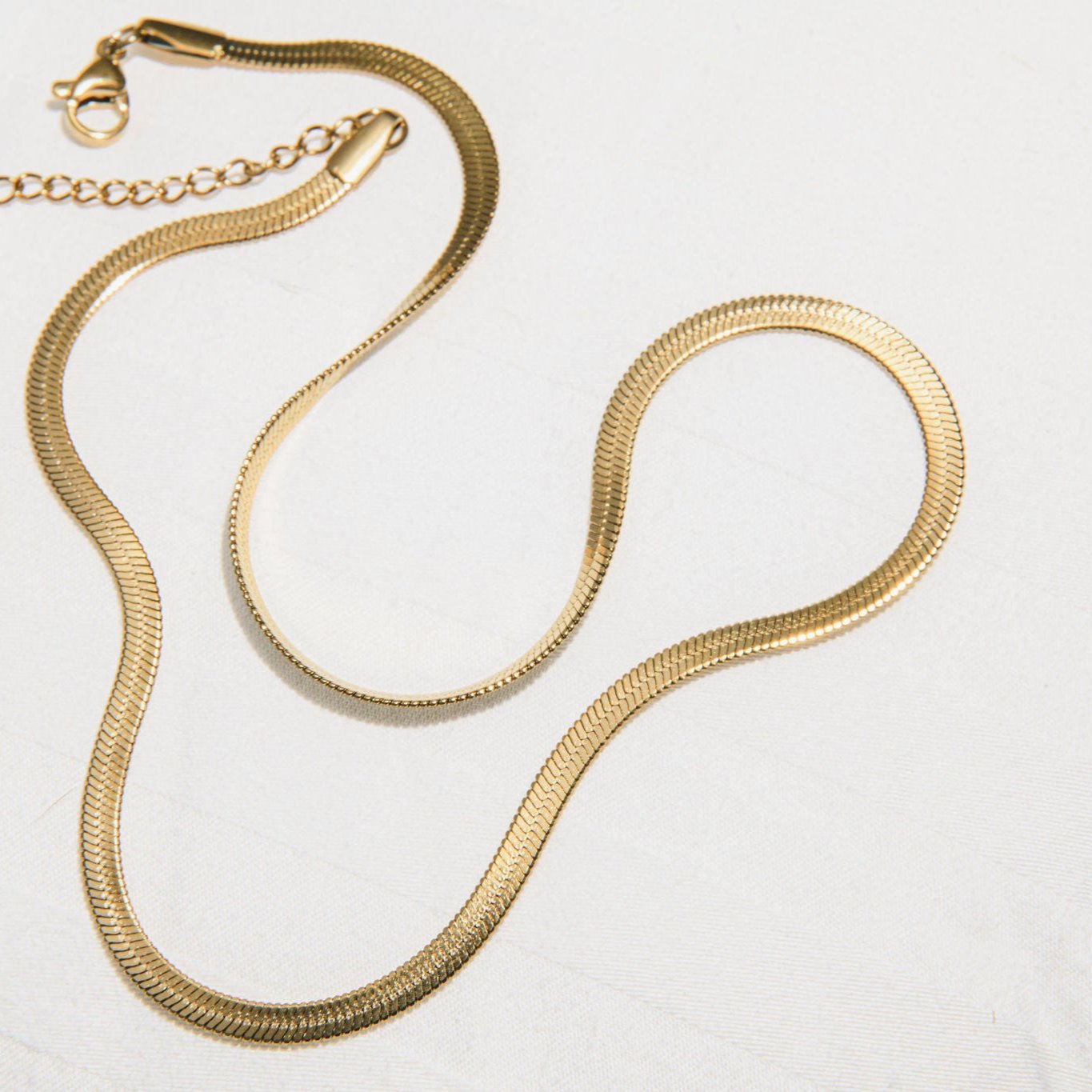 Waterproof gold-plated snake chain necklace, perfect for stacking
