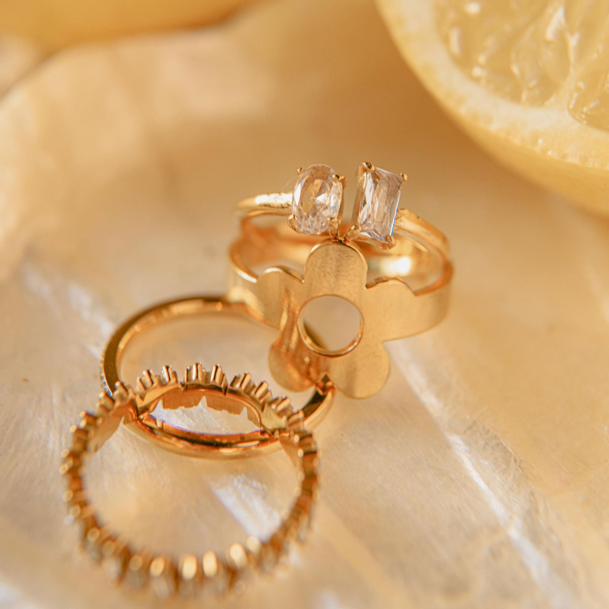 gold Toi et Moi ring with oval and baguette-cut cubic zirconia stones