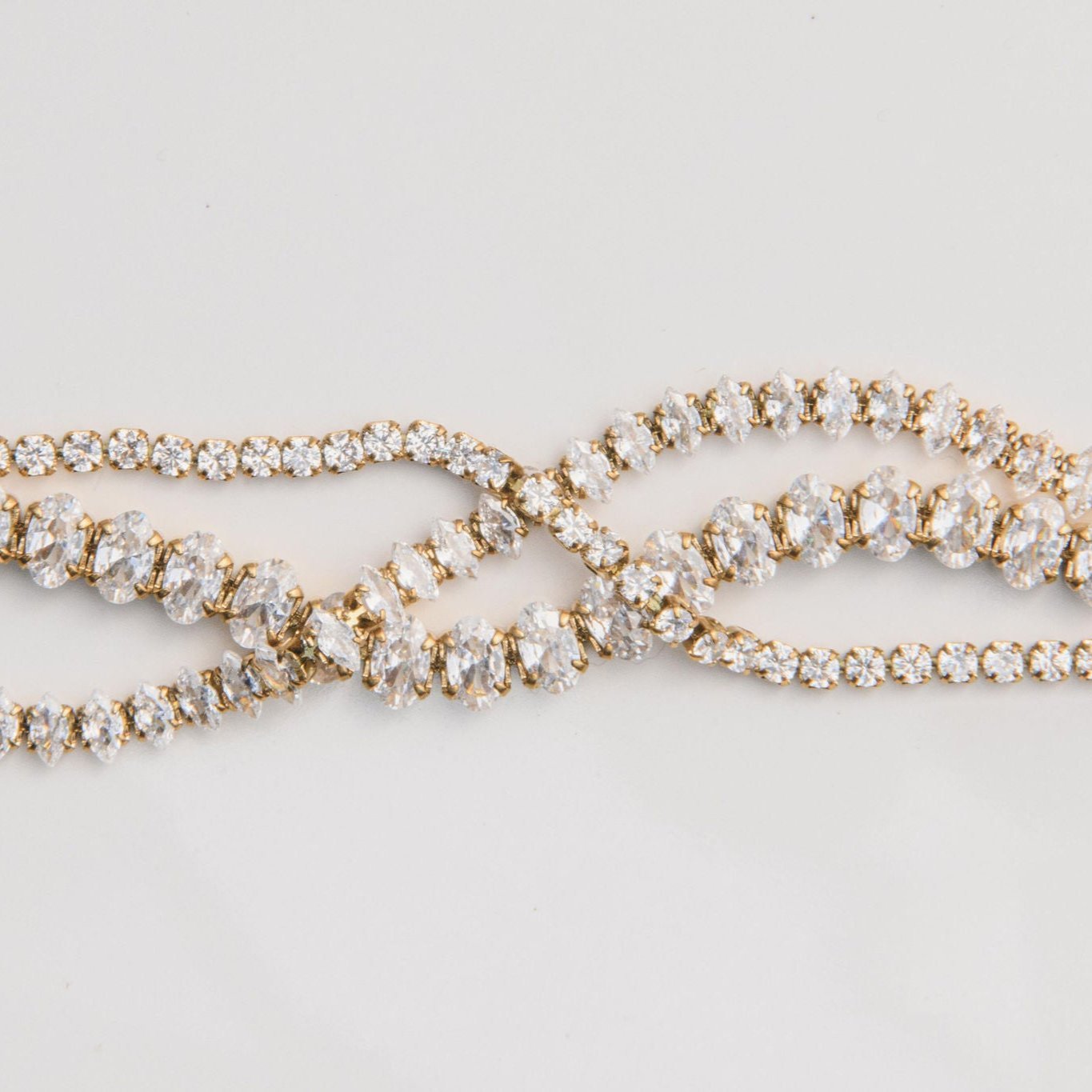 old tennis bracelet with round cubic zirconia stones and adjustable clasp