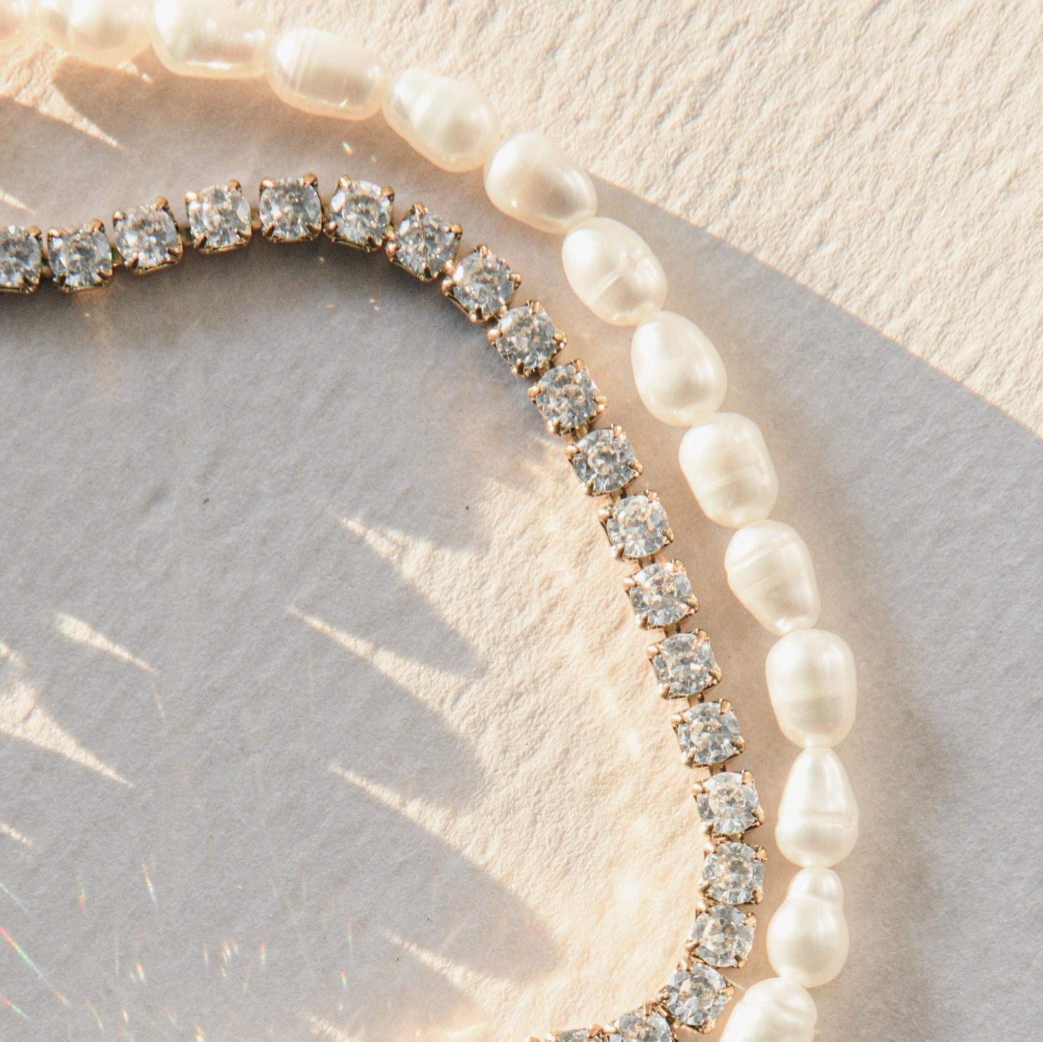Double strand pearl bracelet with freshwater pearls and Cubic Zirconia stones in a waterproof gold setting