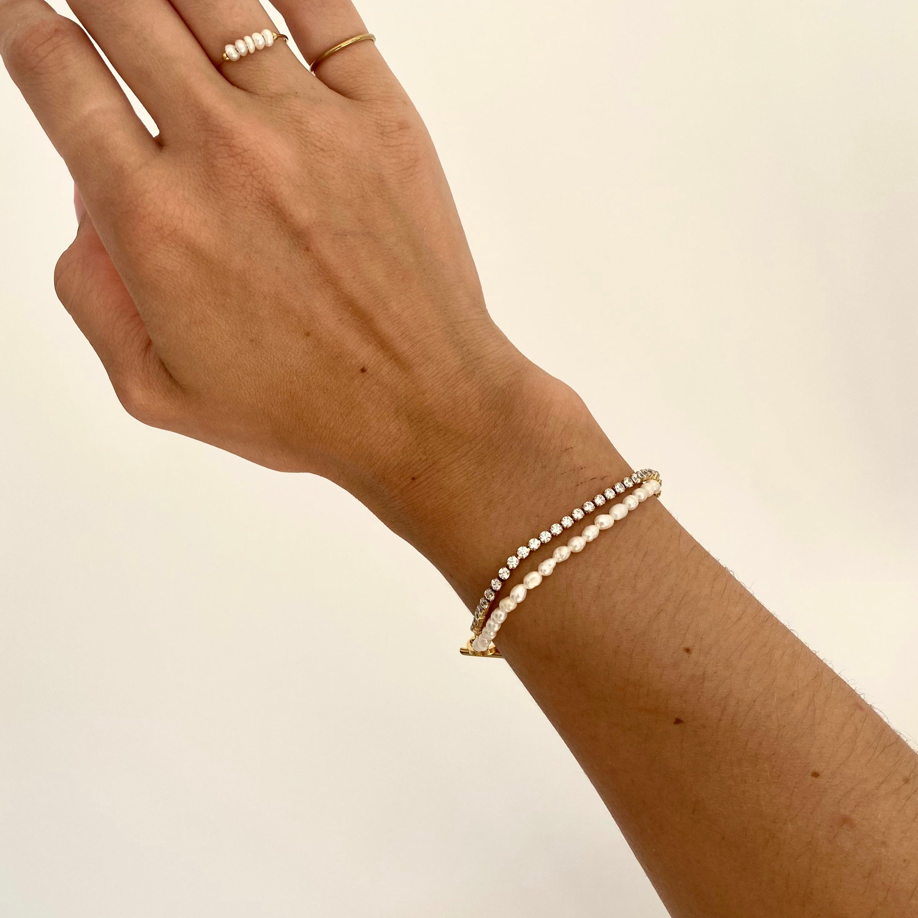 Double strand pearl bracelet with freshwater pearls and Cubic Zirconia stones in a waterproof gold setting