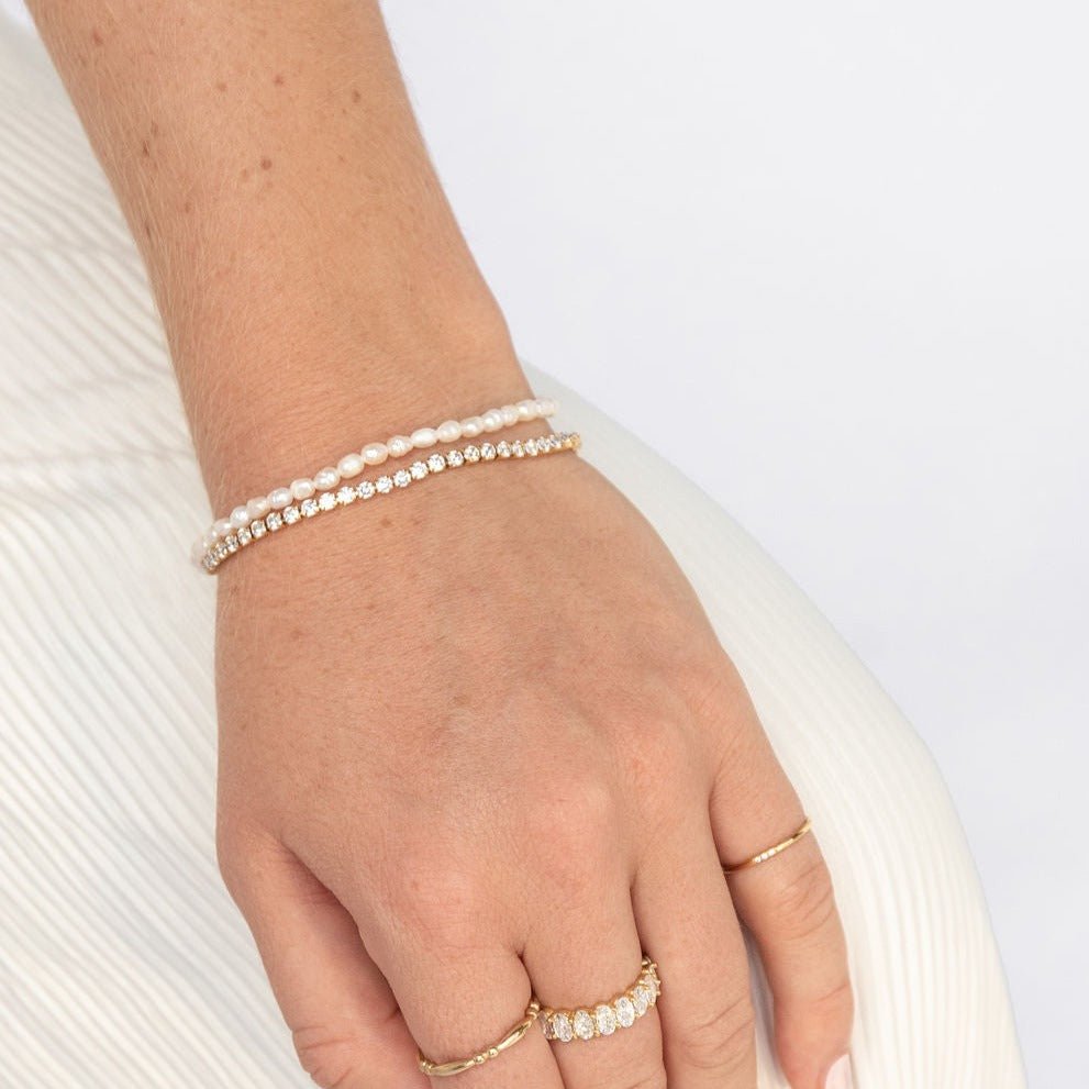 Double strand pearl bracelet with freshwater pearls and Cubic Zirconia stones in a waterproof gold setting