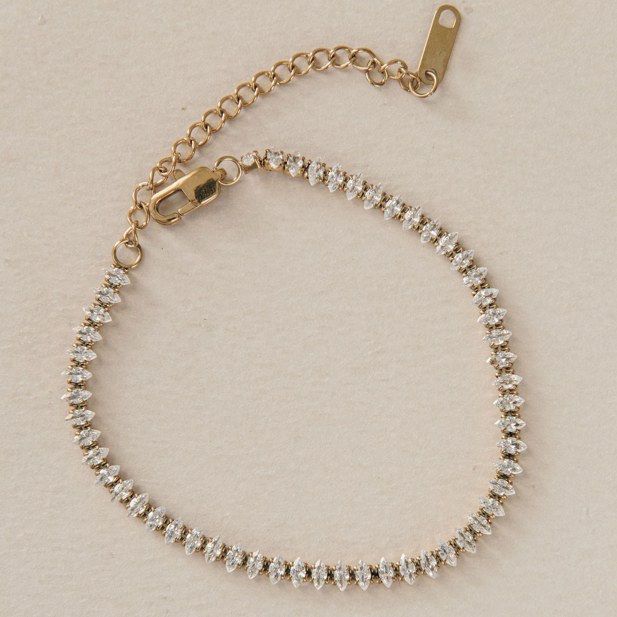 dainty gold tennis bracelet with marquise-cut Cubic Zirconia stones