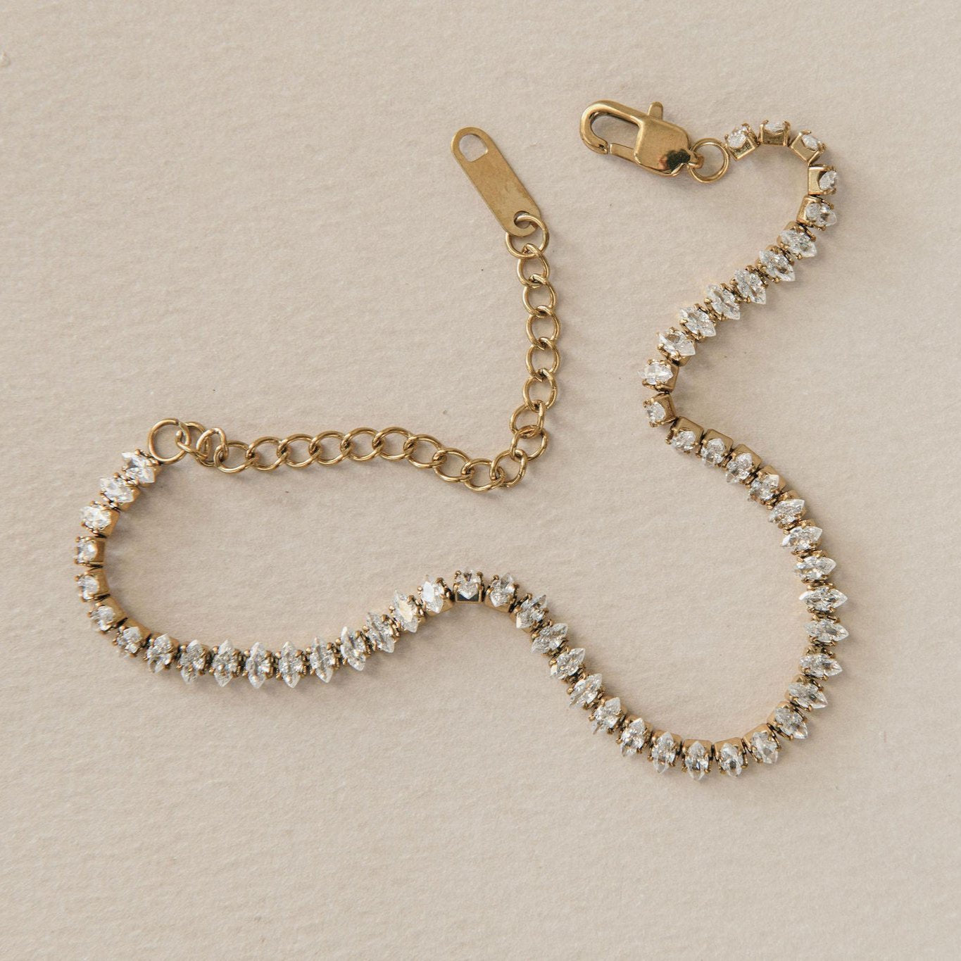 dainty gold tennis bracelet with marquise-cut Cubic Zirconia stones
