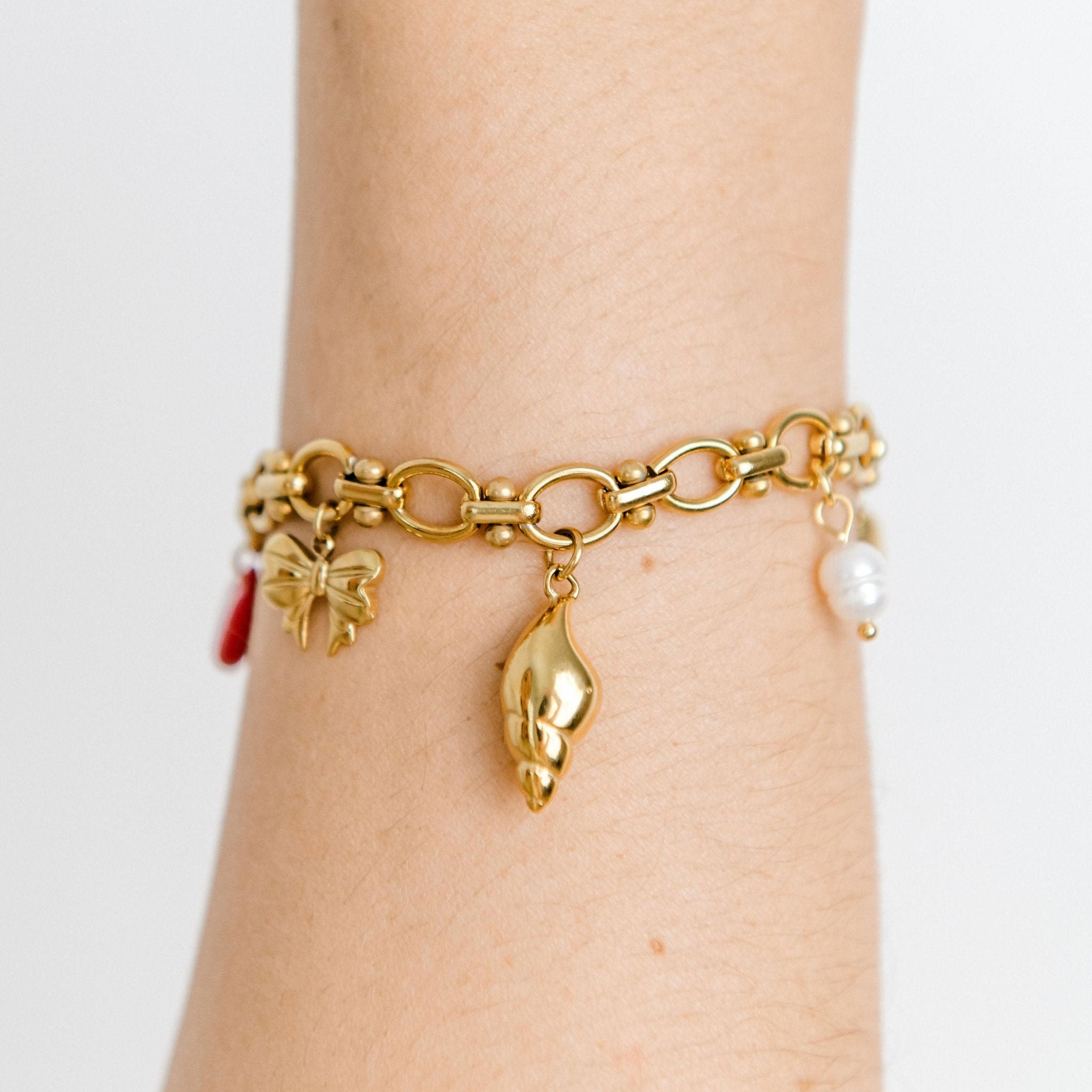 Spiral Shell Charm - Luisa Luxe gold jewellery