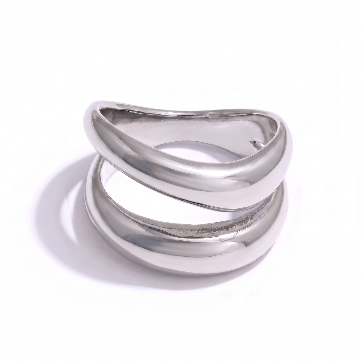 Cove sculptural silver statement ring with an open-front double-band design