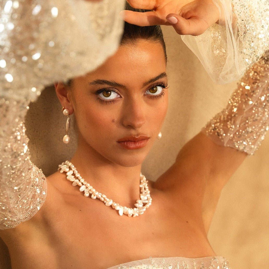 Layered pearl necklace with irregular natural freshwater pearls and gold clasp