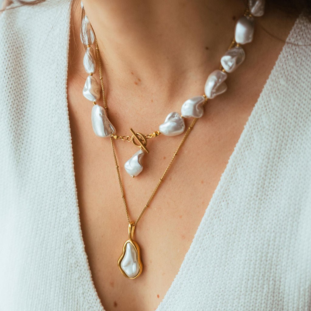 Laguna Necklace with organic freshwater pearl pendant set in waterproof gold on a twisted rope chain