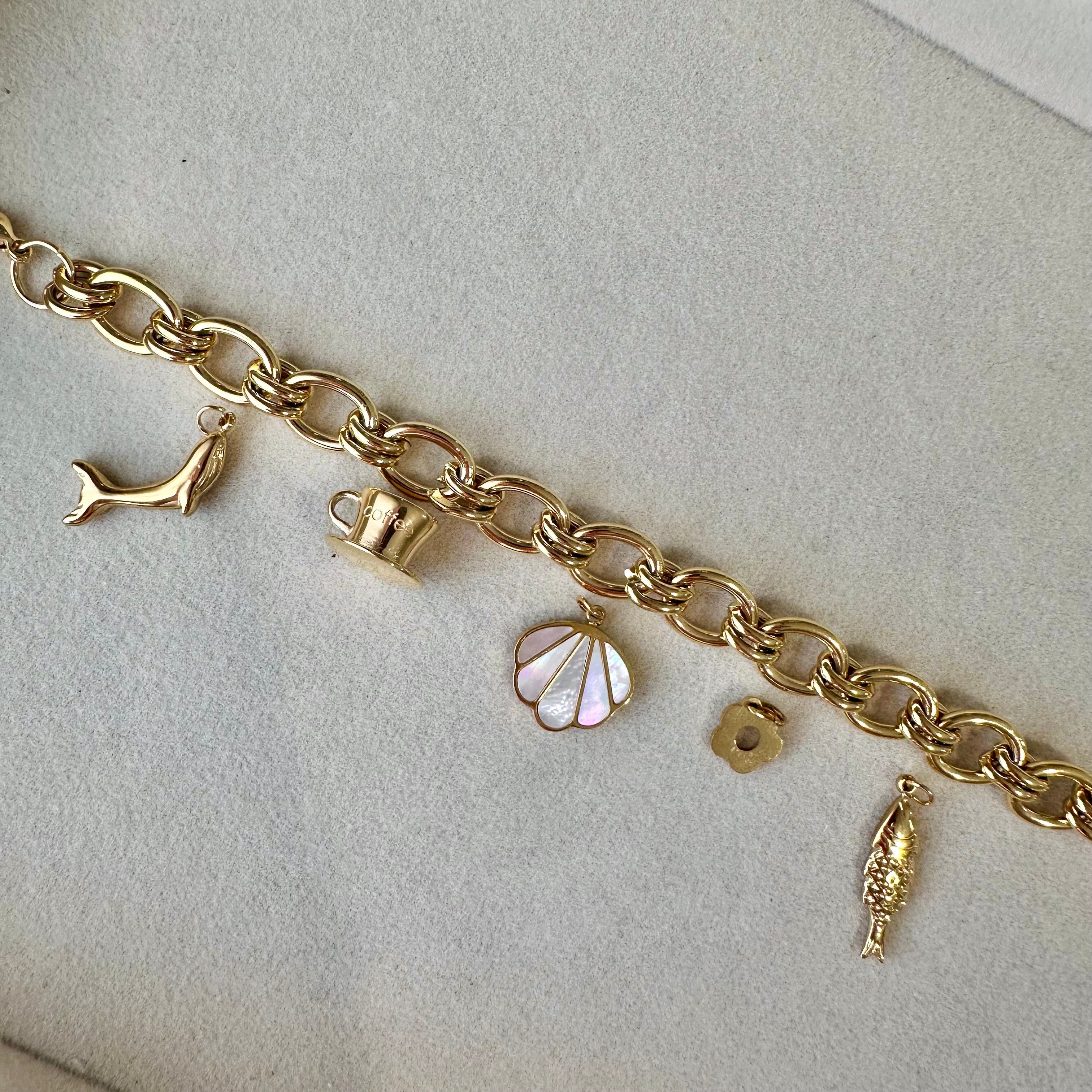 gold loop link charm bracelet for custom charm jewellery and charm bar collection

