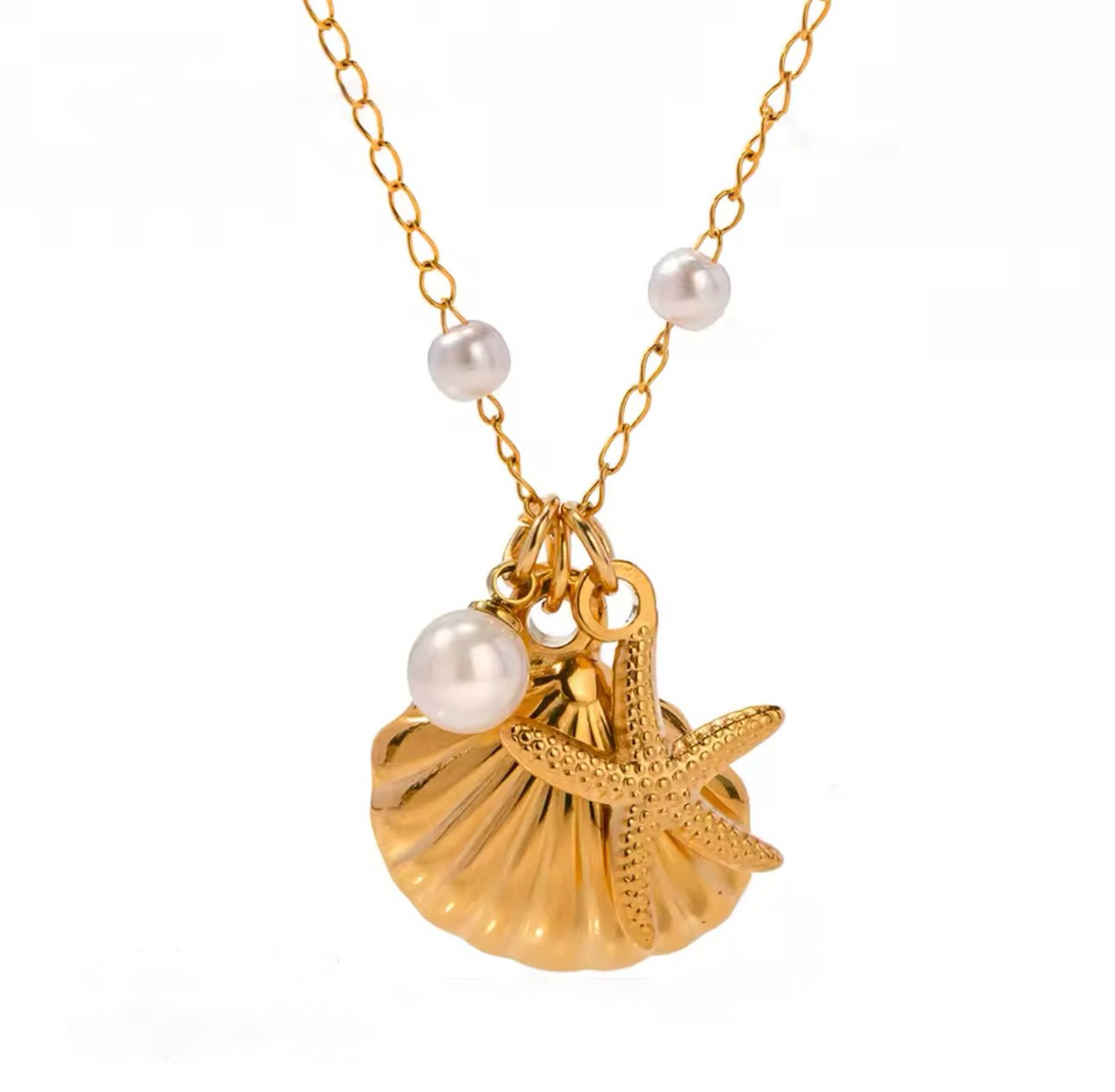 Marina Necklace with gold starfish and shell charms and freshwater pearl accents on a waterproof chain