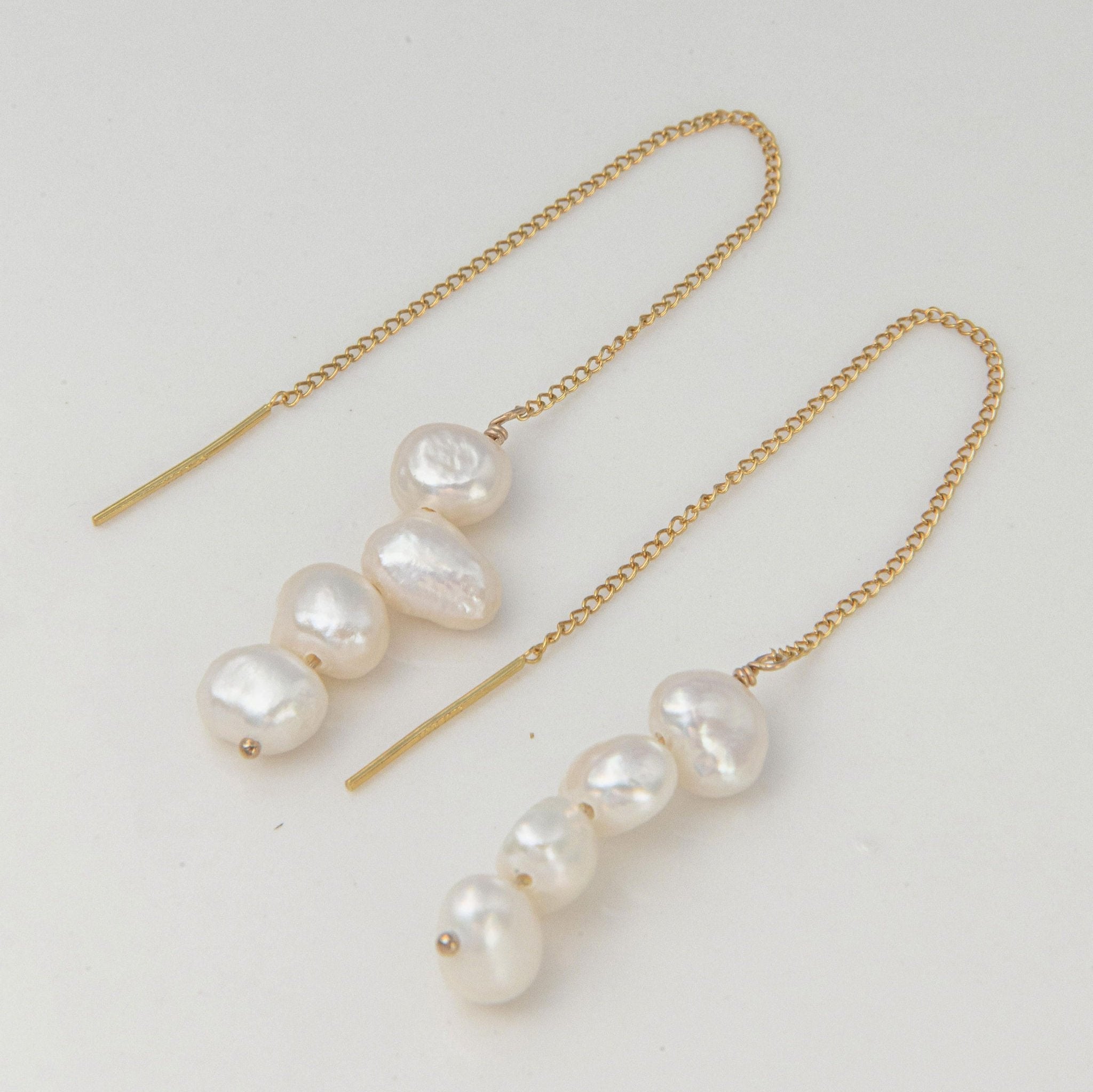 Freshwater pearl drop earrings with waterproof gold thread chain for an elegant, minimalist look