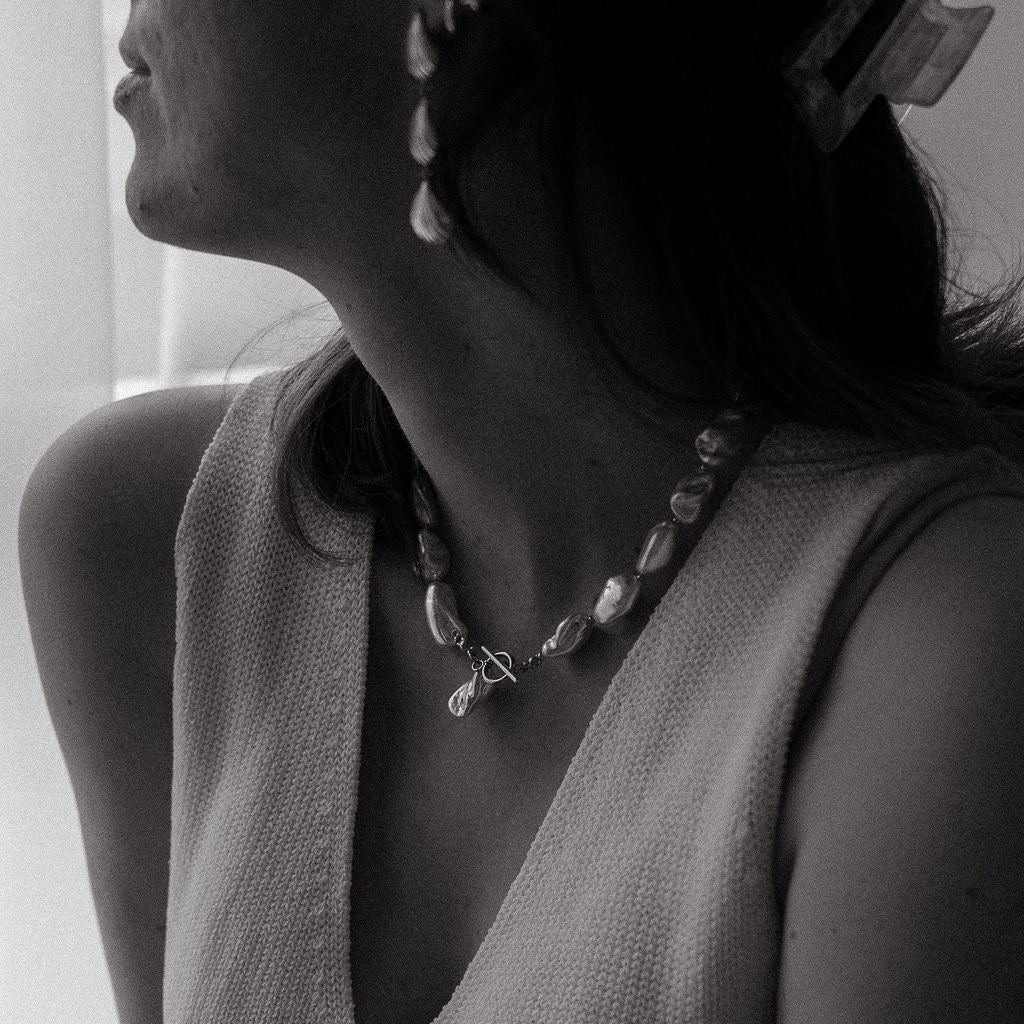Chunky freshwater pearl necklace with waterproof gold clasp and organic statement design.