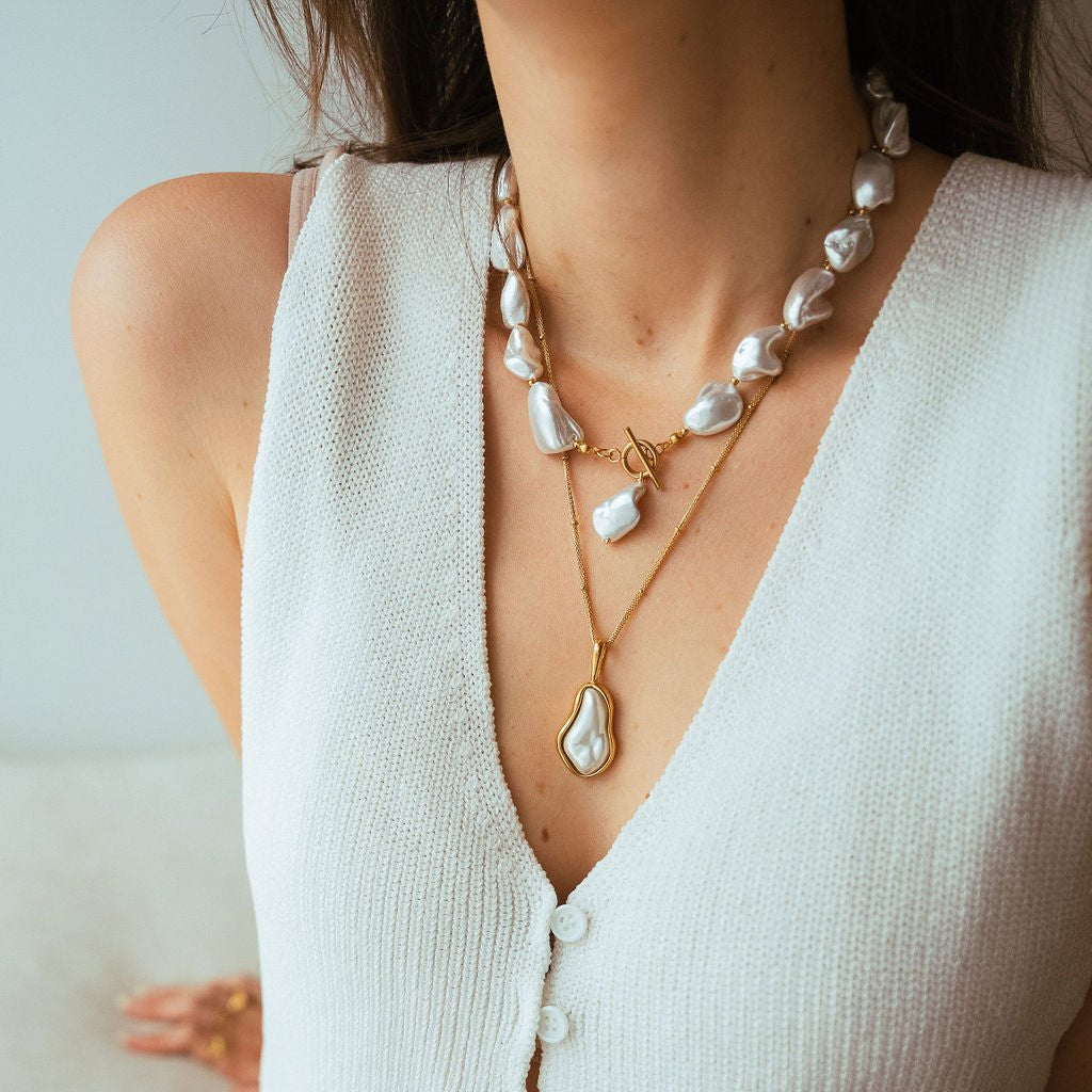 Chunky freshwater pearl necklace with waterproof gold clasp and organic statement design.