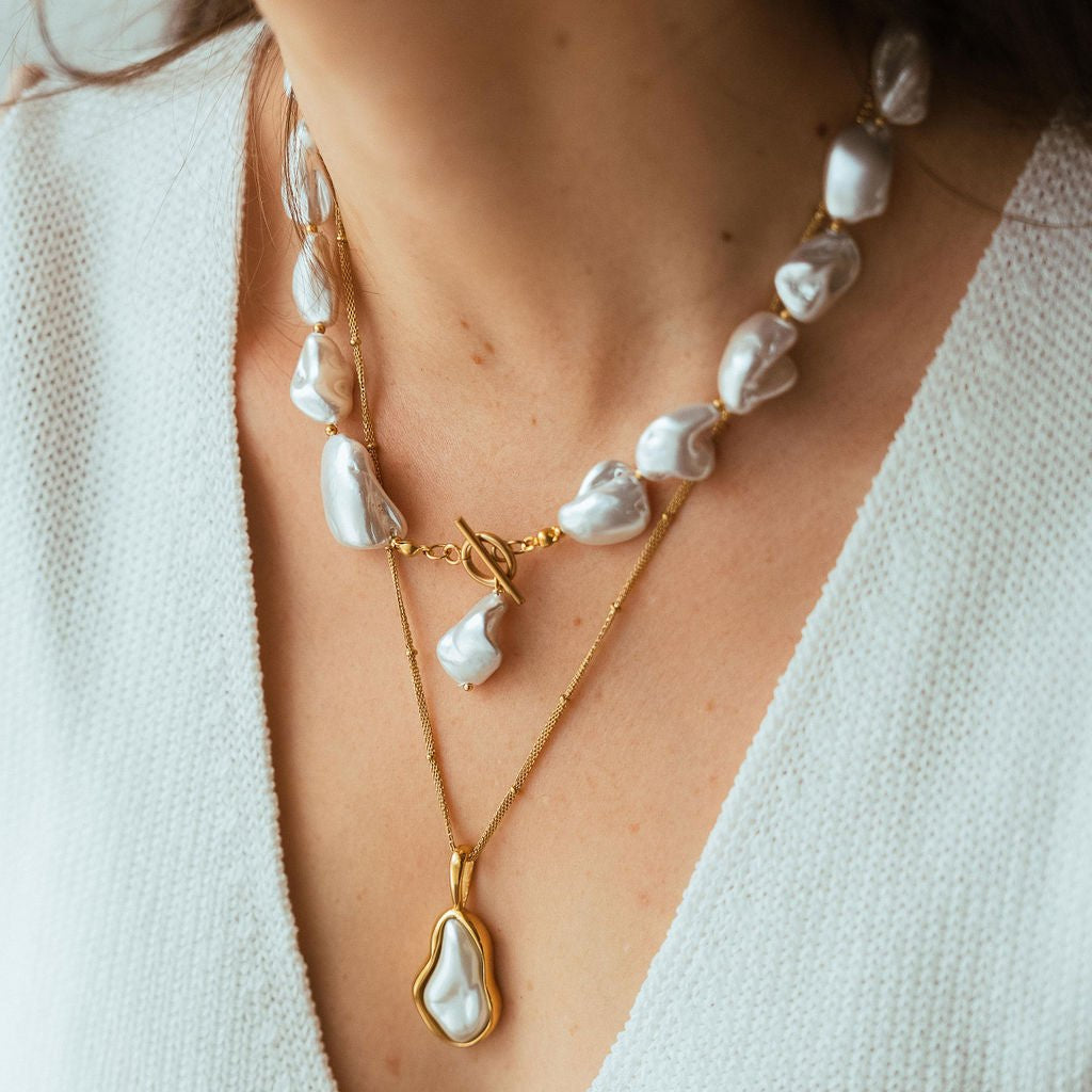 Chunky freshwater pearl necklace with waterproof gold clasp and organic statement design.