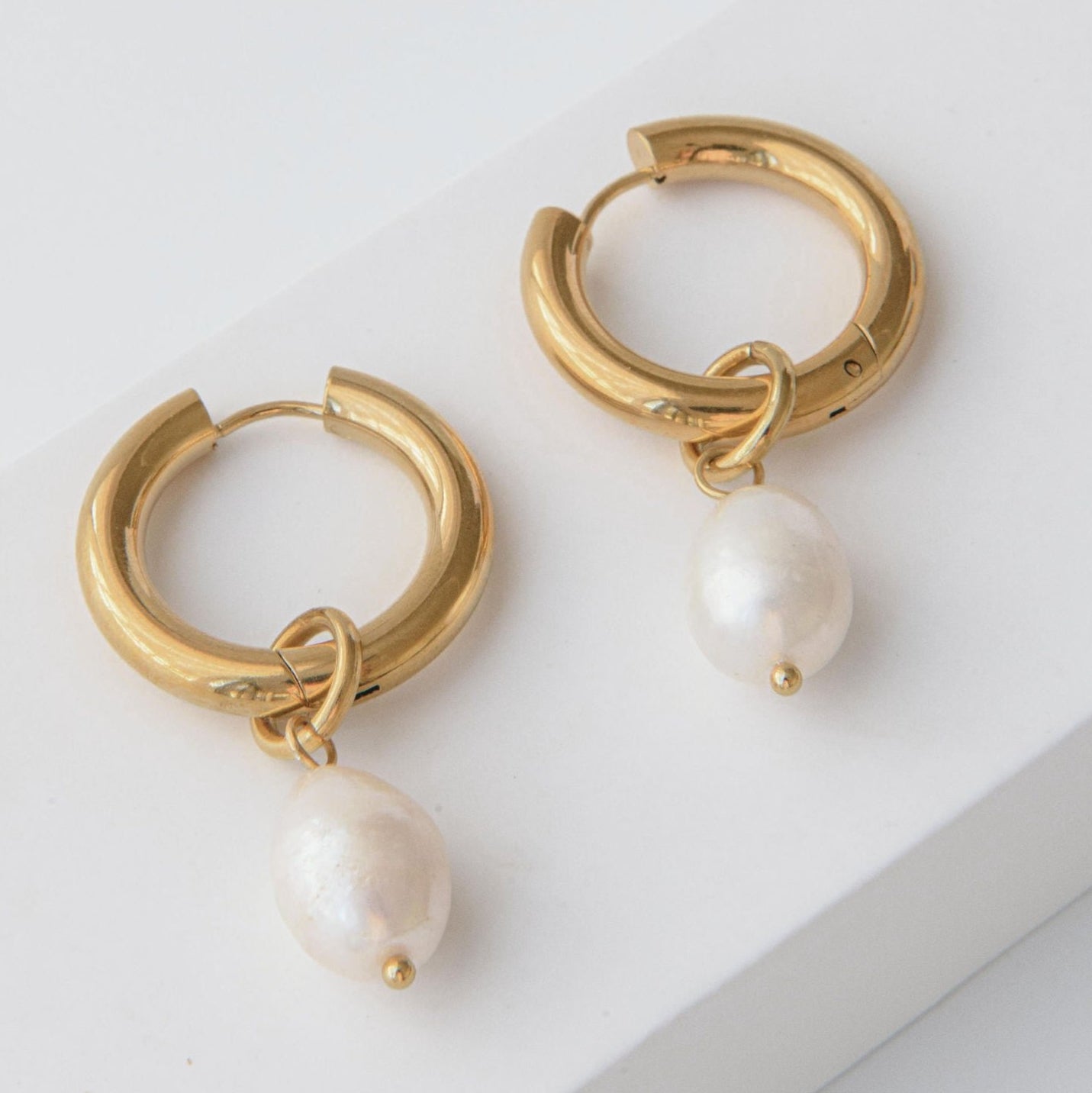 Chunky gold hoop earrings with removable freshwater pearl drops 