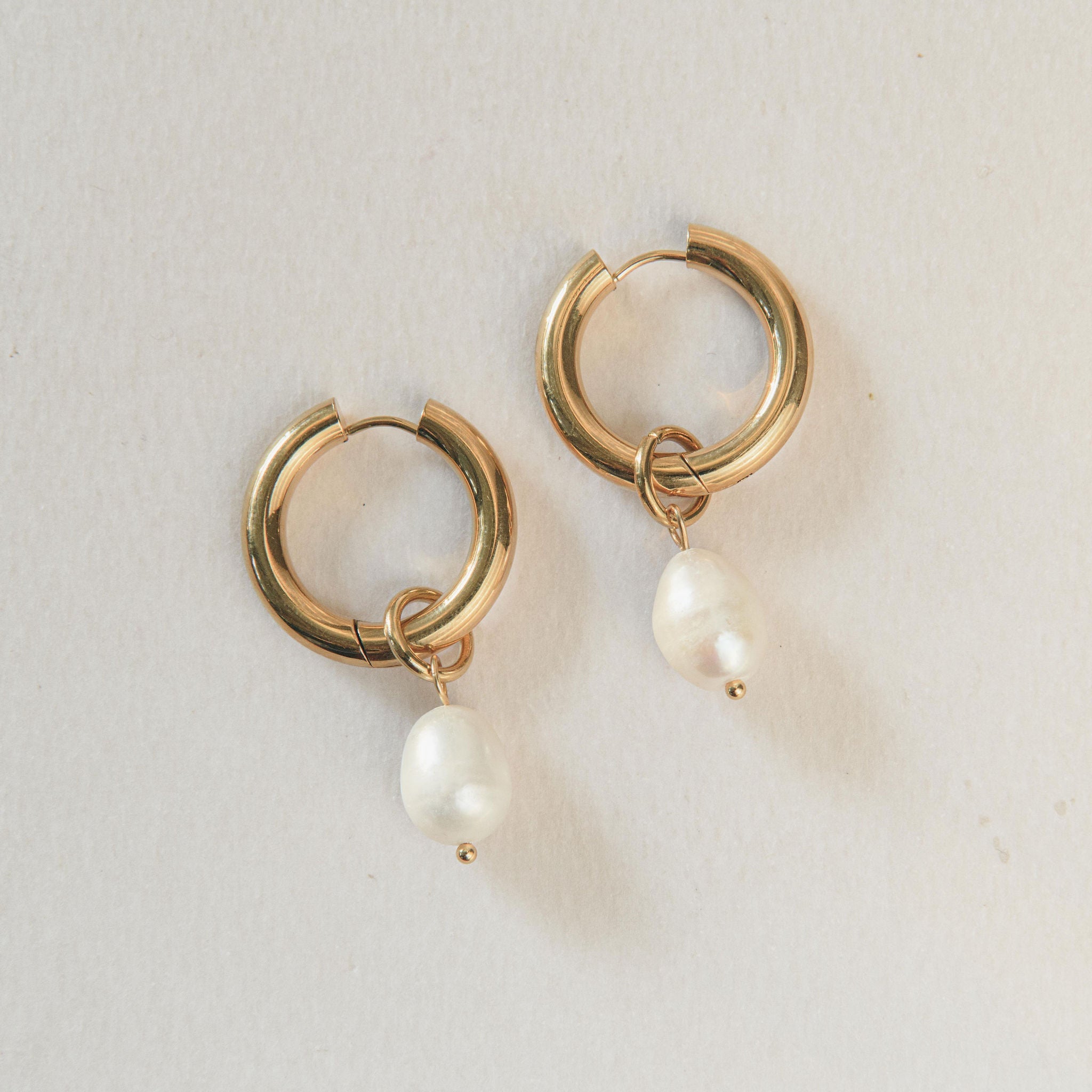 Chunky gold hoop earrings with removable freshwater pearl drops 